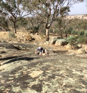 Measuring the well's dimensions.